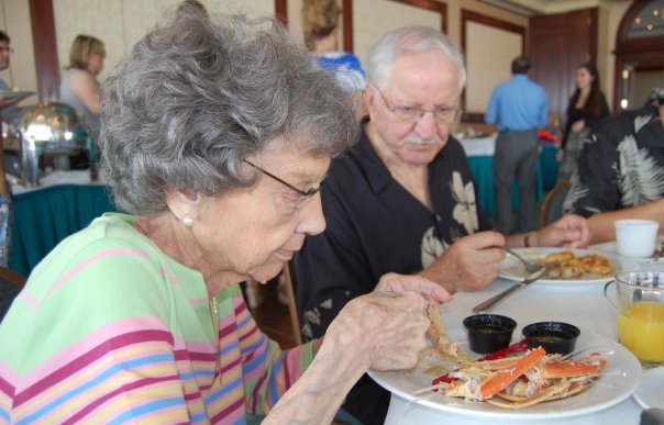 The Focus Look at the focus in my mom's eyes as she tries to squeeze every inch of crab meat out of that leg. Like a surgeon!