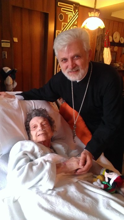 The Father Father Zivan, my parent's parish priest, came by to give my mom her final blessing. She loved Father Zivan like he was family. I think he felt the same about her.